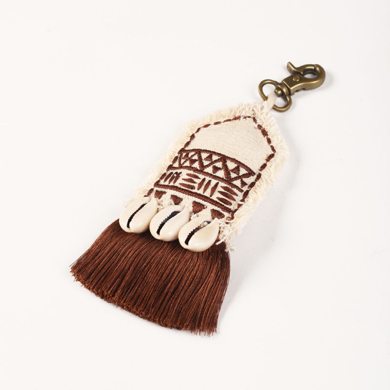 Tribal tassel, handmade, boho bag charm, gypsy charm with cowrie