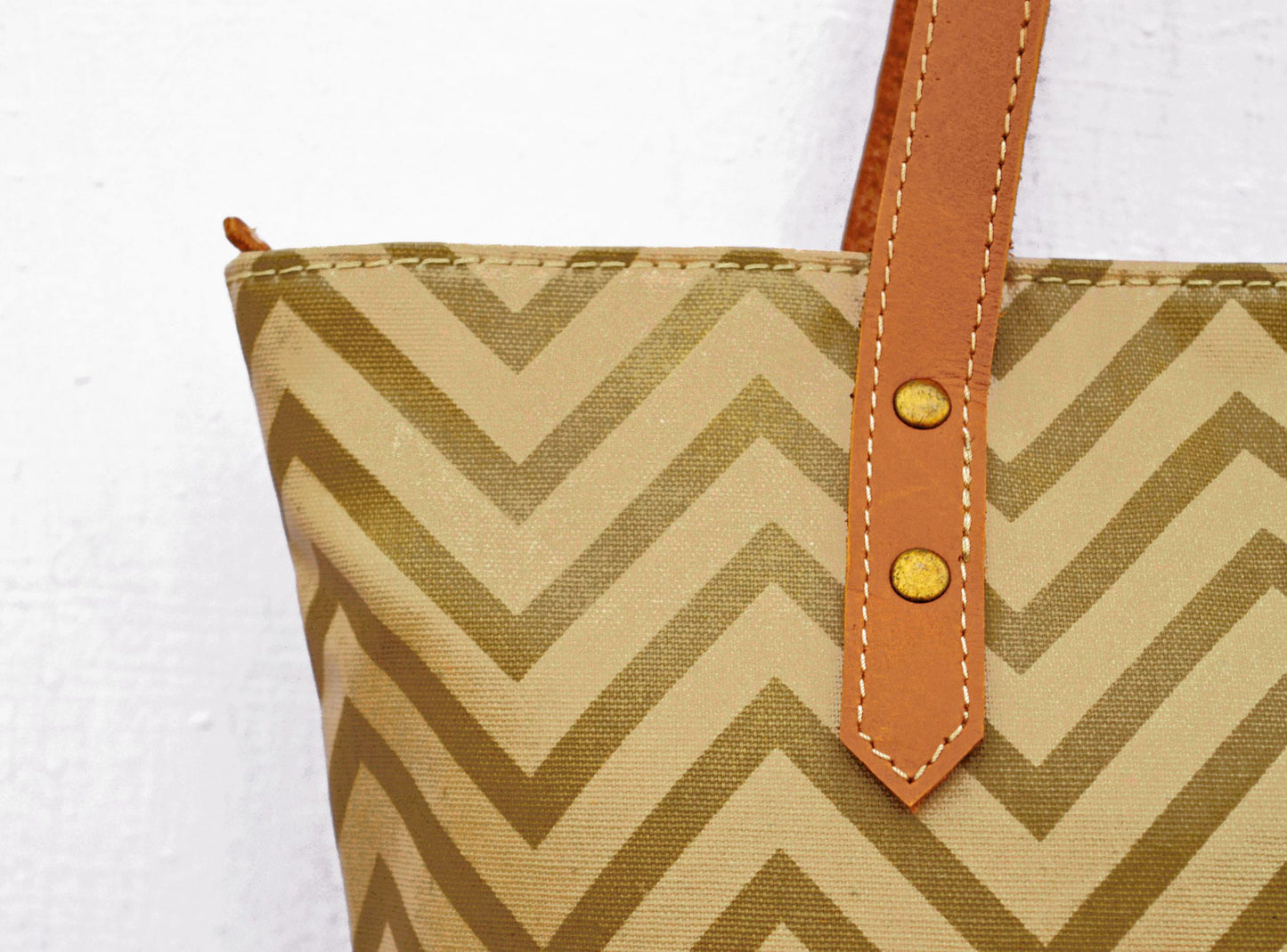 Beige Tote bag, laminated cotton, chevron print, sheen finish, leather trims, zip closure, everyday bag.