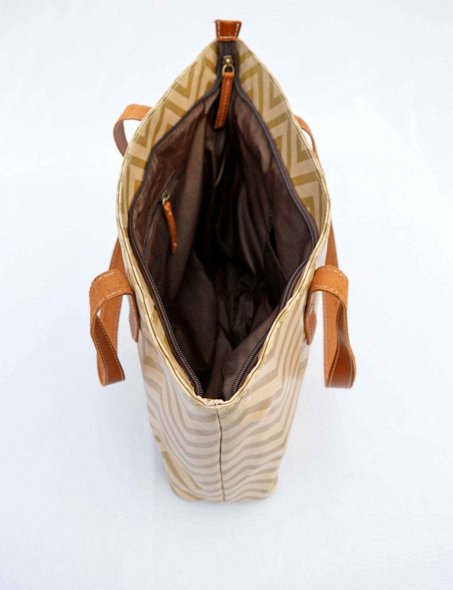 Beige Tote bag, laminated cotton, chevron print, sheen finish, leather trims, zip closure, everyday bag.