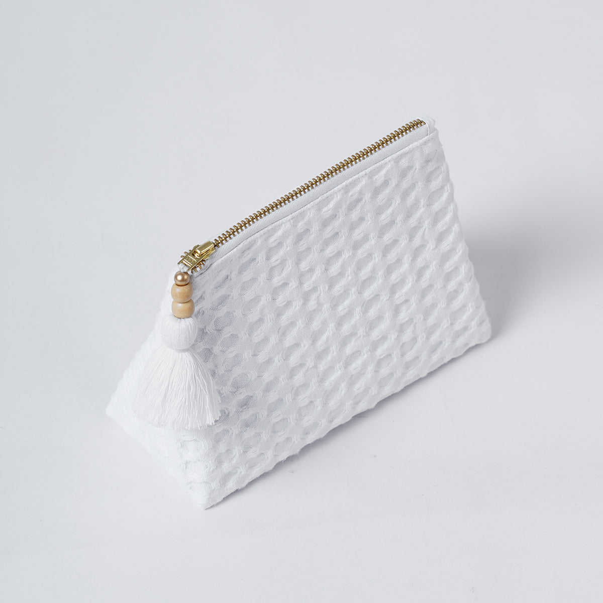 A pair of White Waffle Nesting pouches