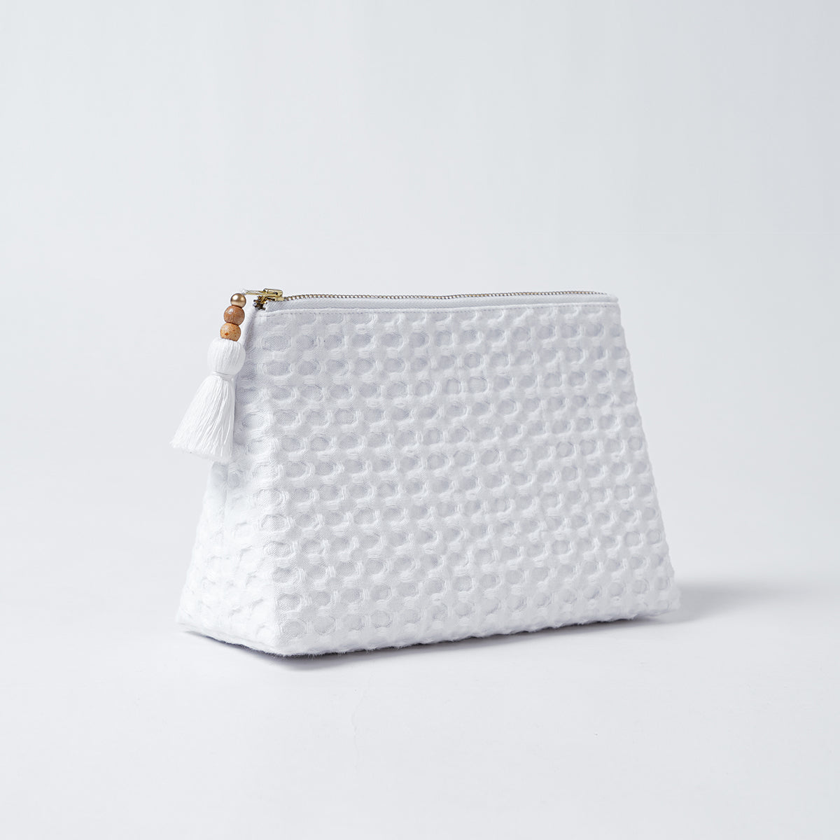 A pair of White Waffle Nesting pouches