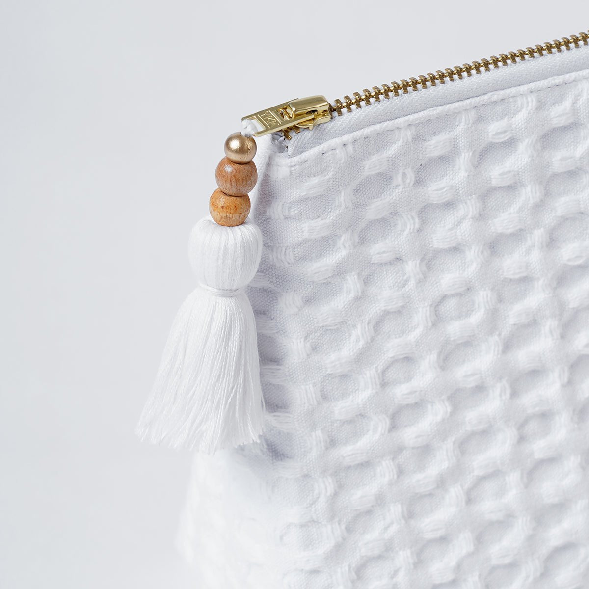 A pair of White Waffle Nesting pouches
