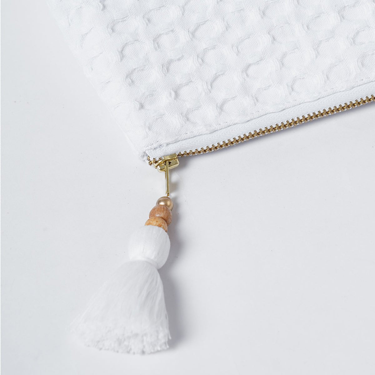 A pair of White Waffle Nesting pouches