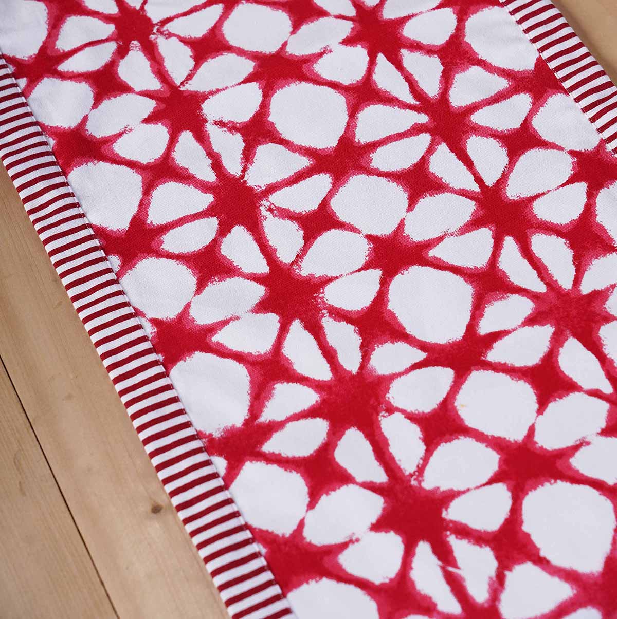 Red table runner, tie dye prism print, red stripe border, sizes available