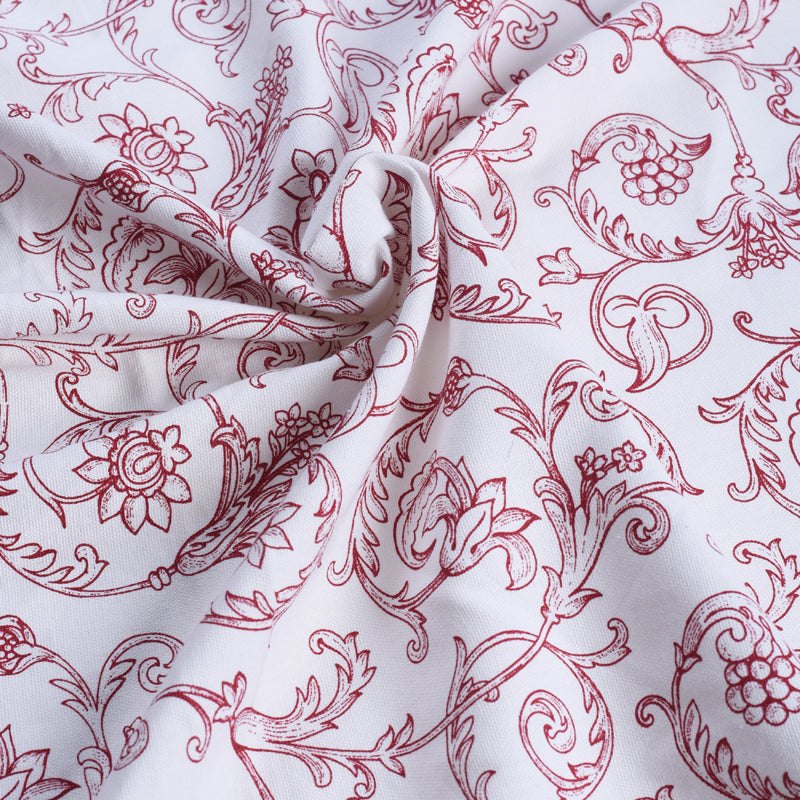 Red printed fabric, swirl pattern, Victorian pattern.