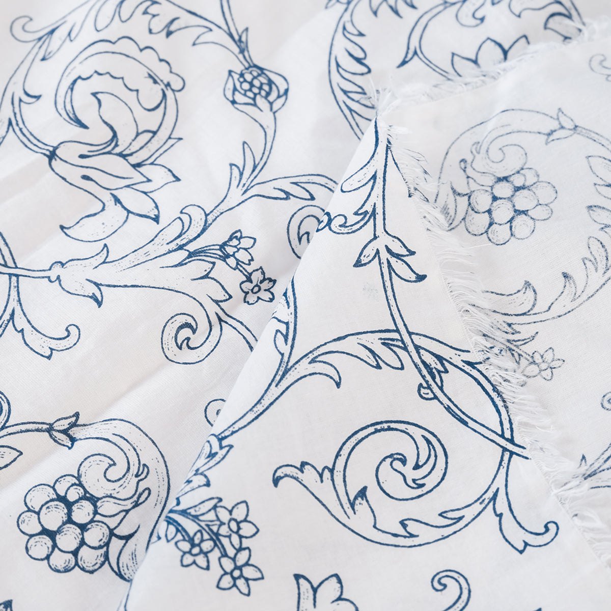 Blue printed sheer fabric, Victorian swirl pattern