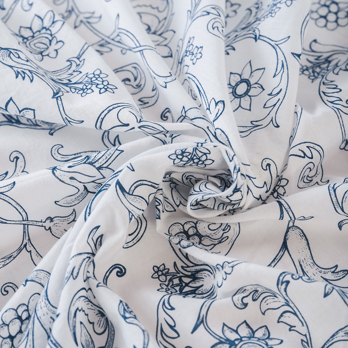 Blue printed sheer fabric, Victorian swirl pattern