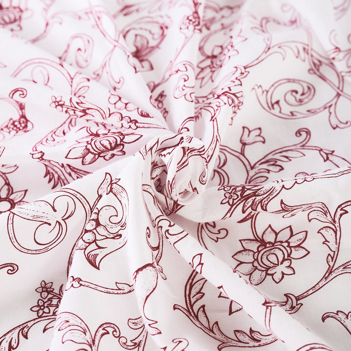 Red printed sheer fabric, Victorian swirl pattern