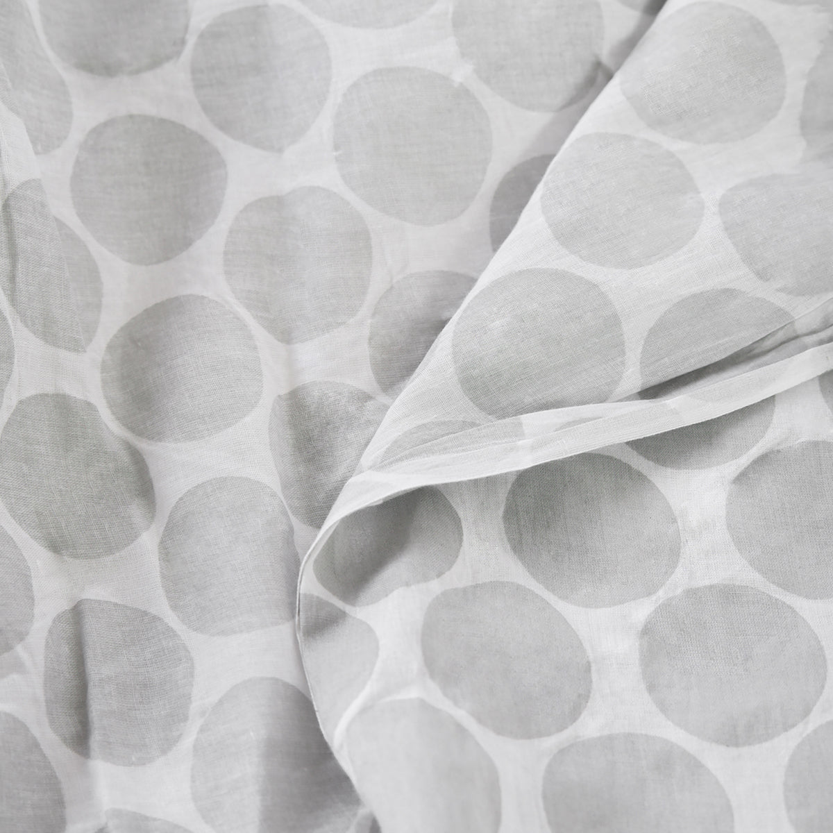 Grey polka print sheer fabric