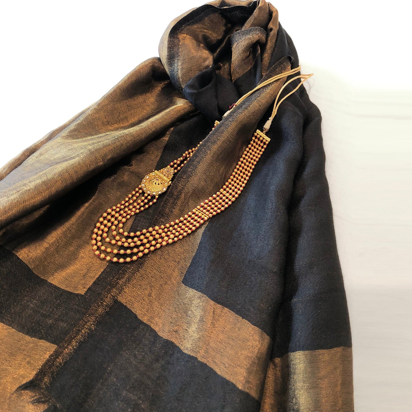 Black fine wool scarf with gold zari border, reversible stole