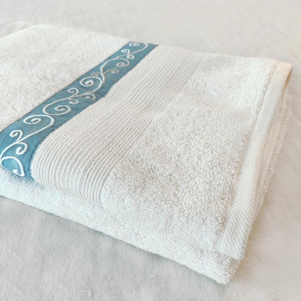 Swirl Embroidery white organic cotton Bath towels, sizes available