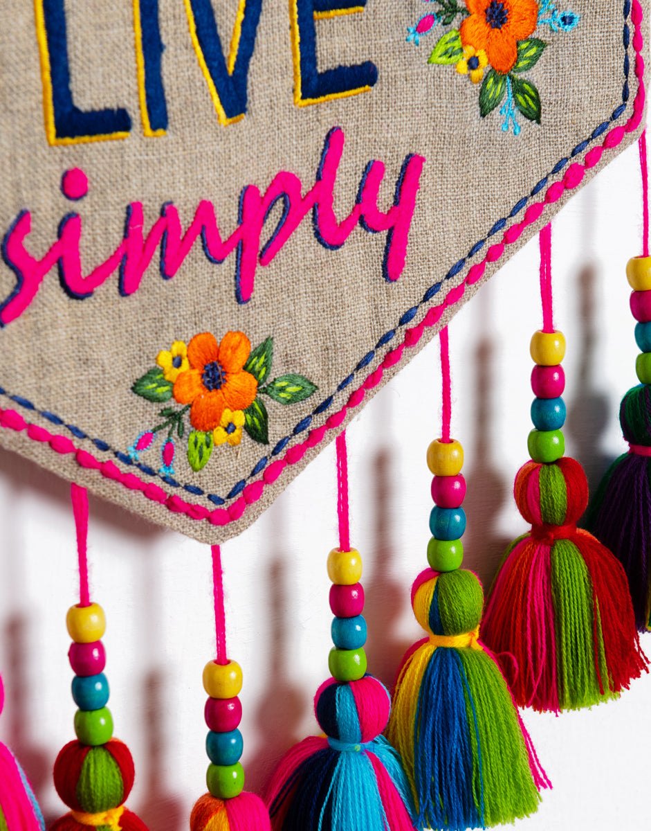 Quotation Wall art - embroidered triangular linen wall art with multicolour tassels