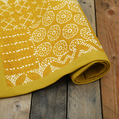Cotton printed rug in mustard colour with geometric print