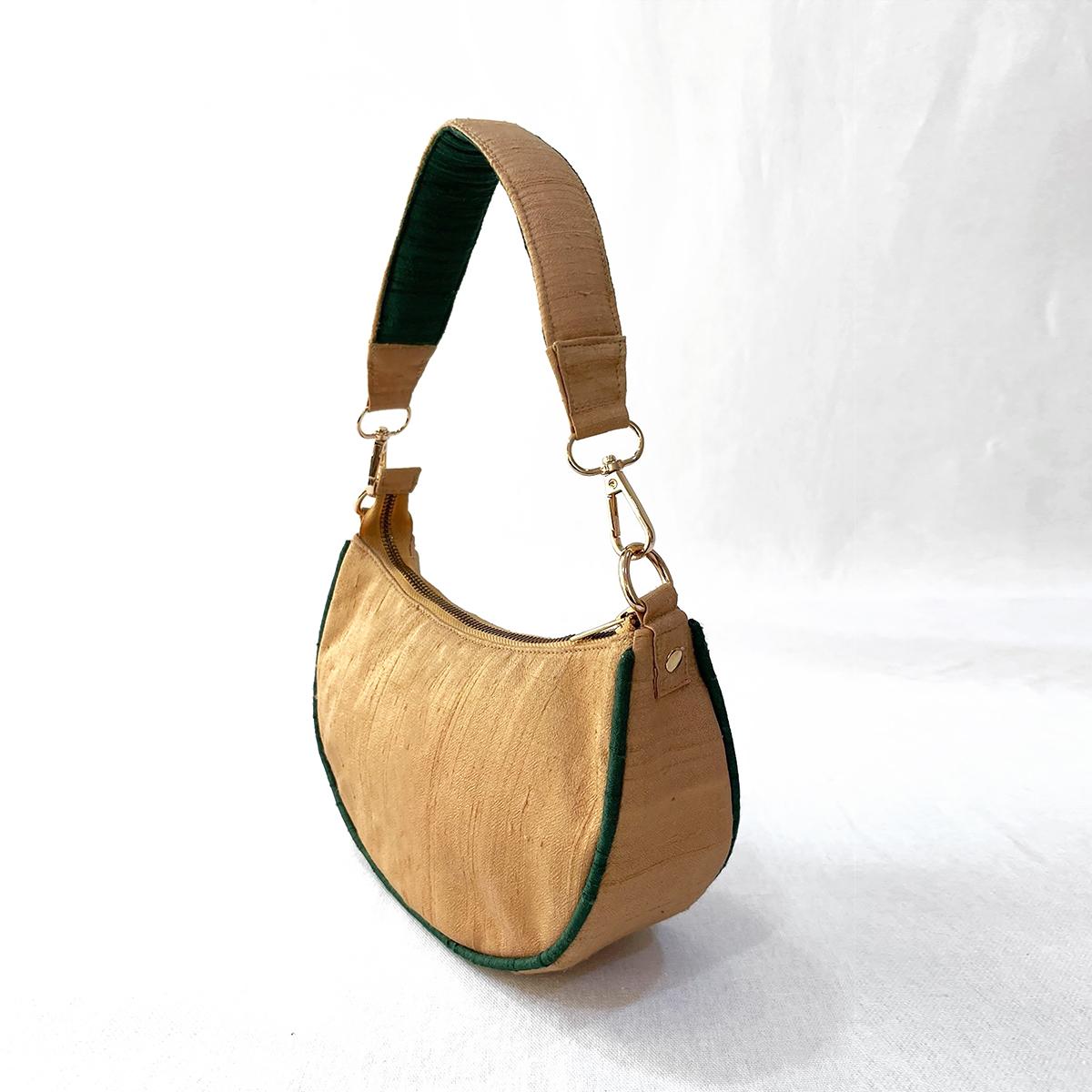 Bottega Veneta® Small Cobble Shoulder Bag in Dark green. Shop online now.