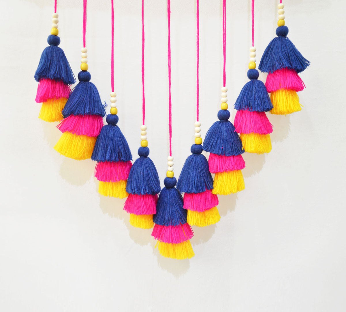 Wall art - cascade tassel and Pompom garland wall hanging