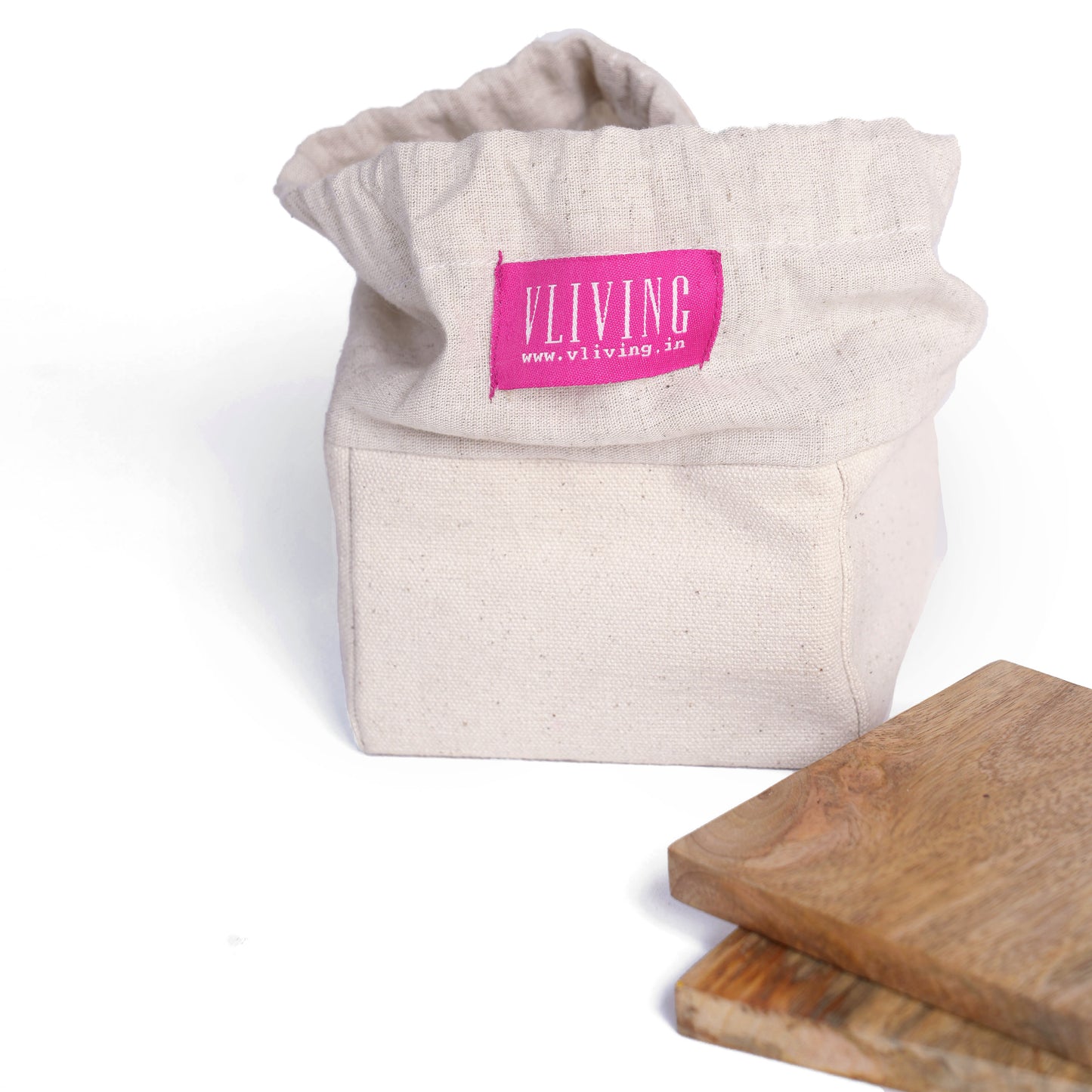 Pack of 6 mango wood coasters packed in a canvas drawstring bag.