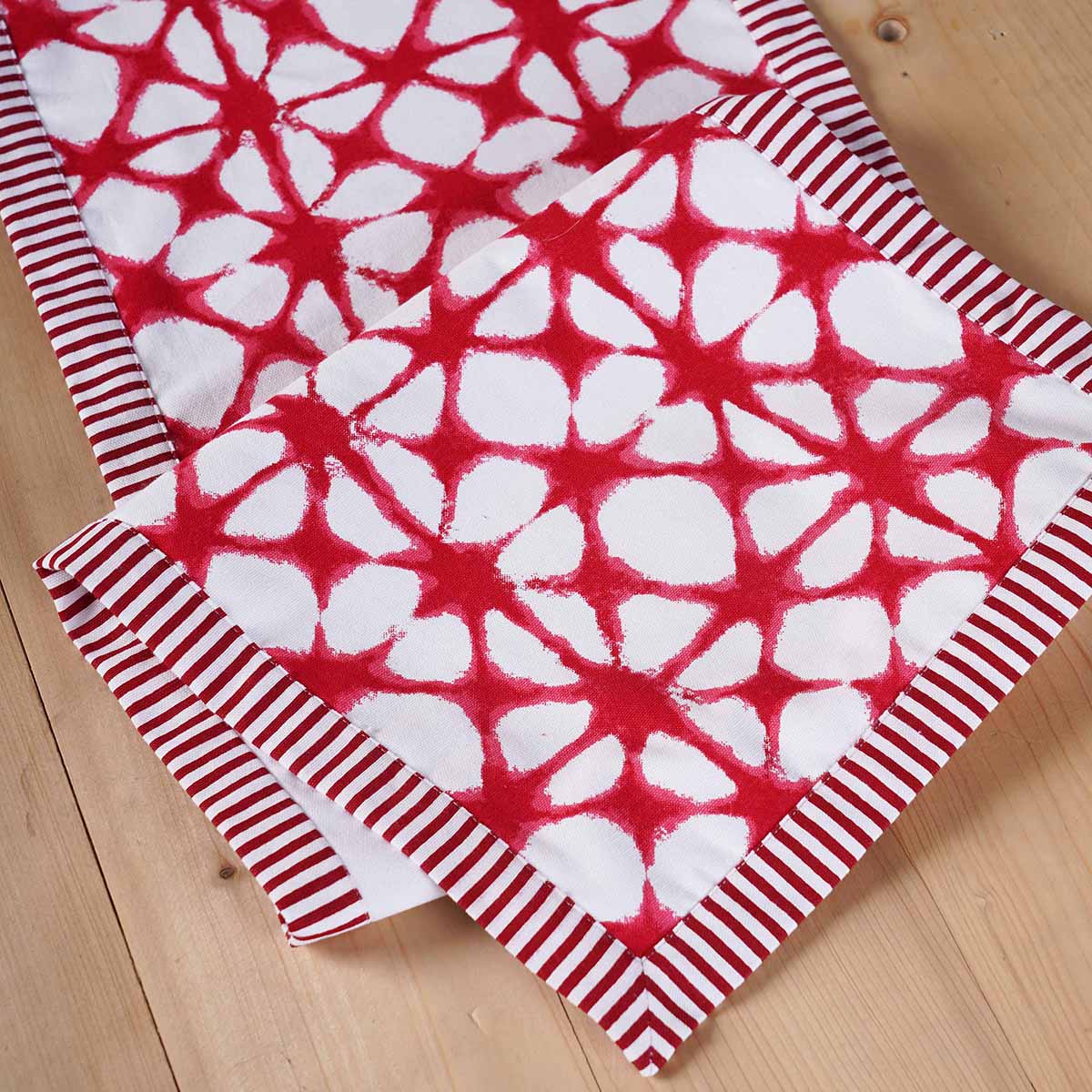 Red table runner, tie dye prism print, red stripe border, sizes available