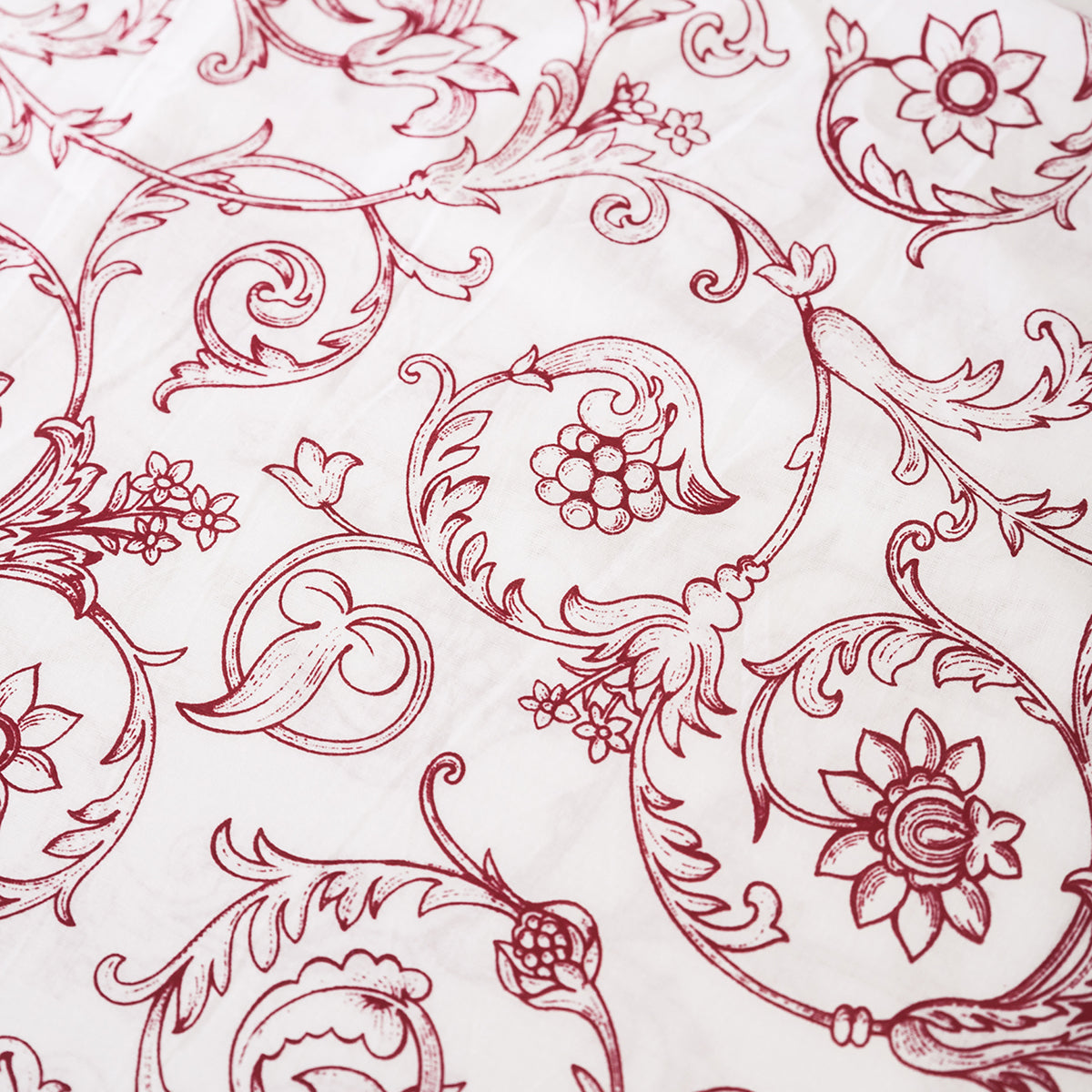 Red printed sheer fabric, Victorian swirl pattern