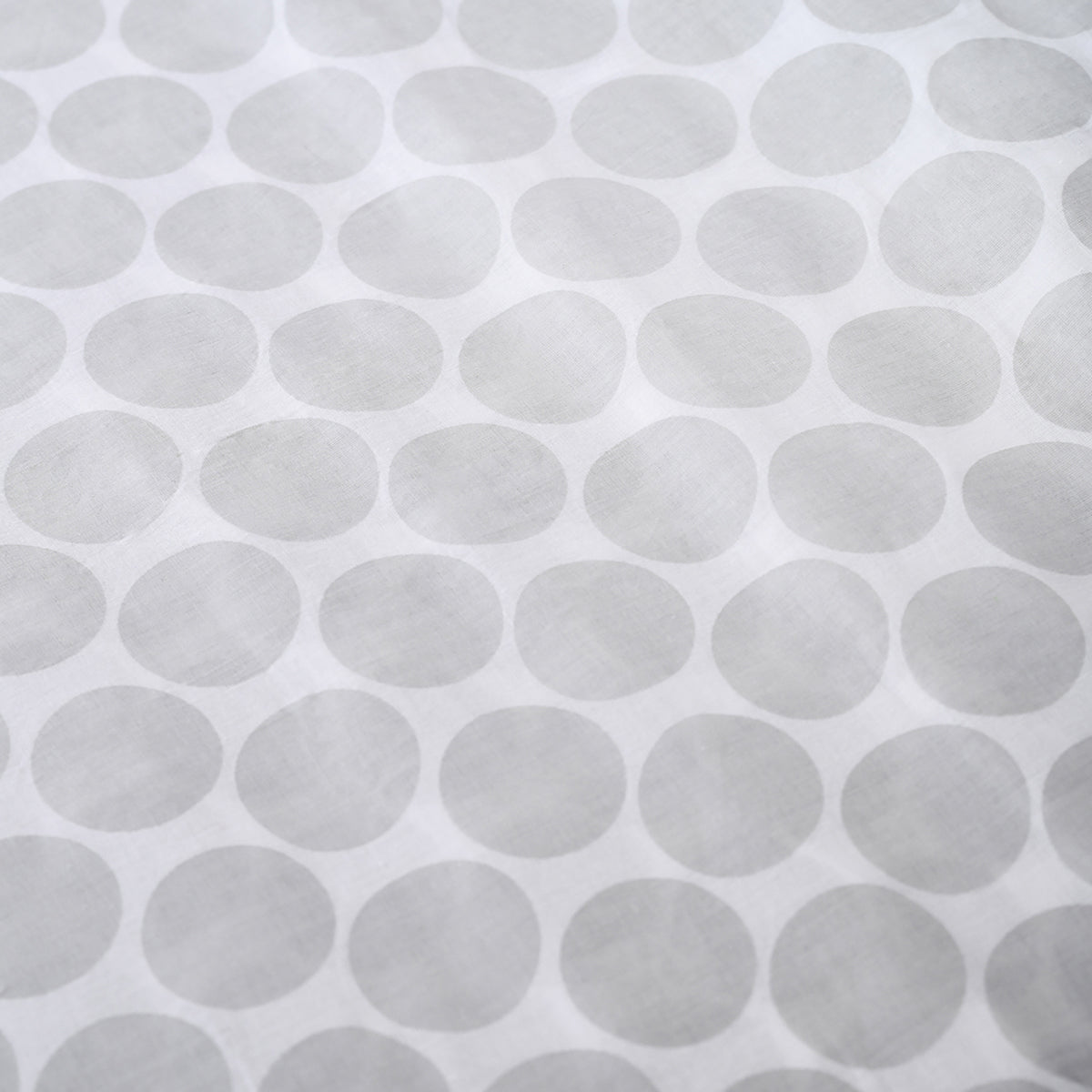 Grey polka print sheer fabric