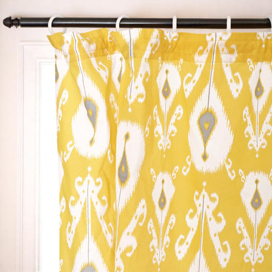 Ikat - Sheer cotton ikat print curtain panel in yellow colour.