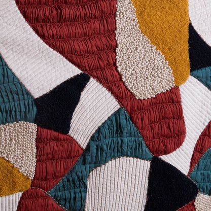 Vliving abstract patchwork textile wall art with teal, red, gold, ivory, black, and brown textured fabrics.