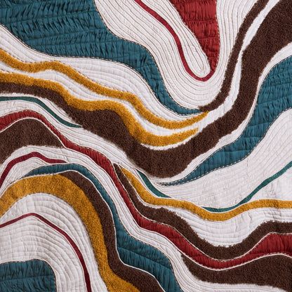 Vliving abstract textile wall art with wavy lines in teal, red, mustard, ivory, black, and brown.