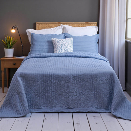 Vliving denim blue quilted cotton bedspread with stripe quilting and border, includes pillow shams.
