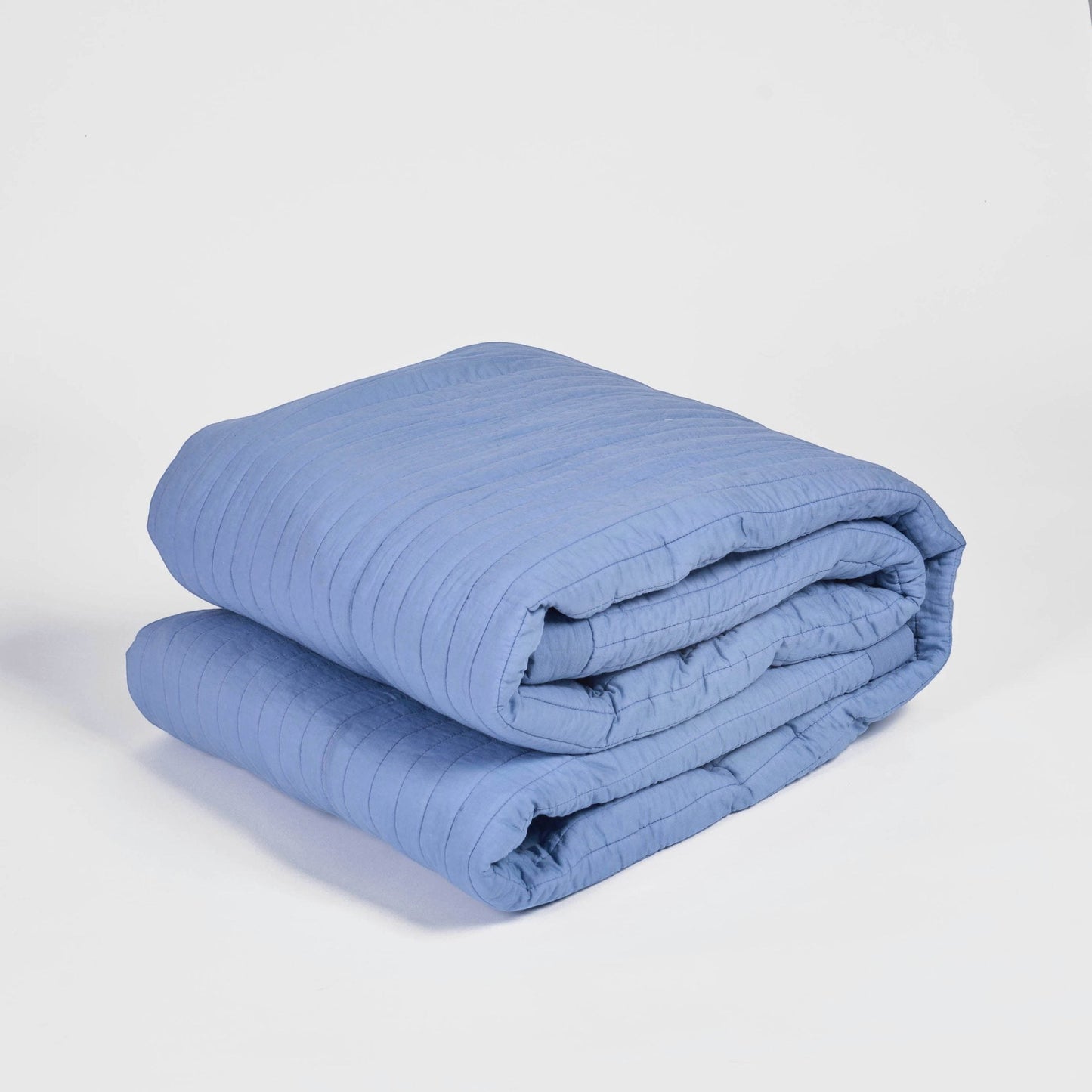 Vliving denim blue quilted cotton voile bed blanket with stripe pattern and 2 inch border. Soft and cozy for all seasons.