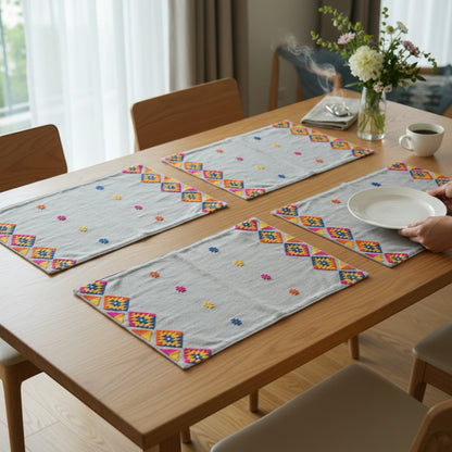 Vliving grey linen table mats with multicolour kilim embroidery and geometric patterns. Set of 4.