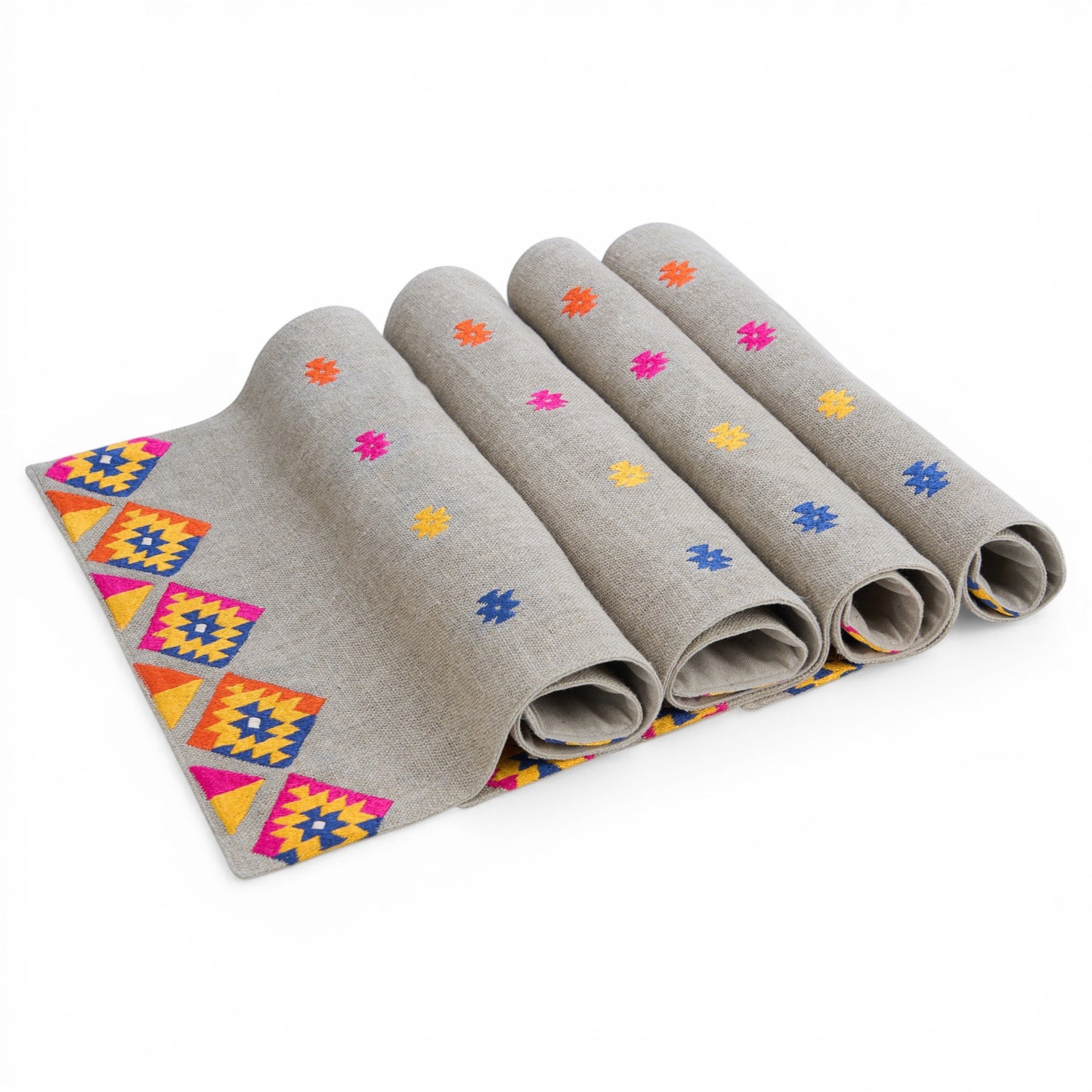 Vliving grey linen table mats with multicolour kilim embroidery and geometric patterns.