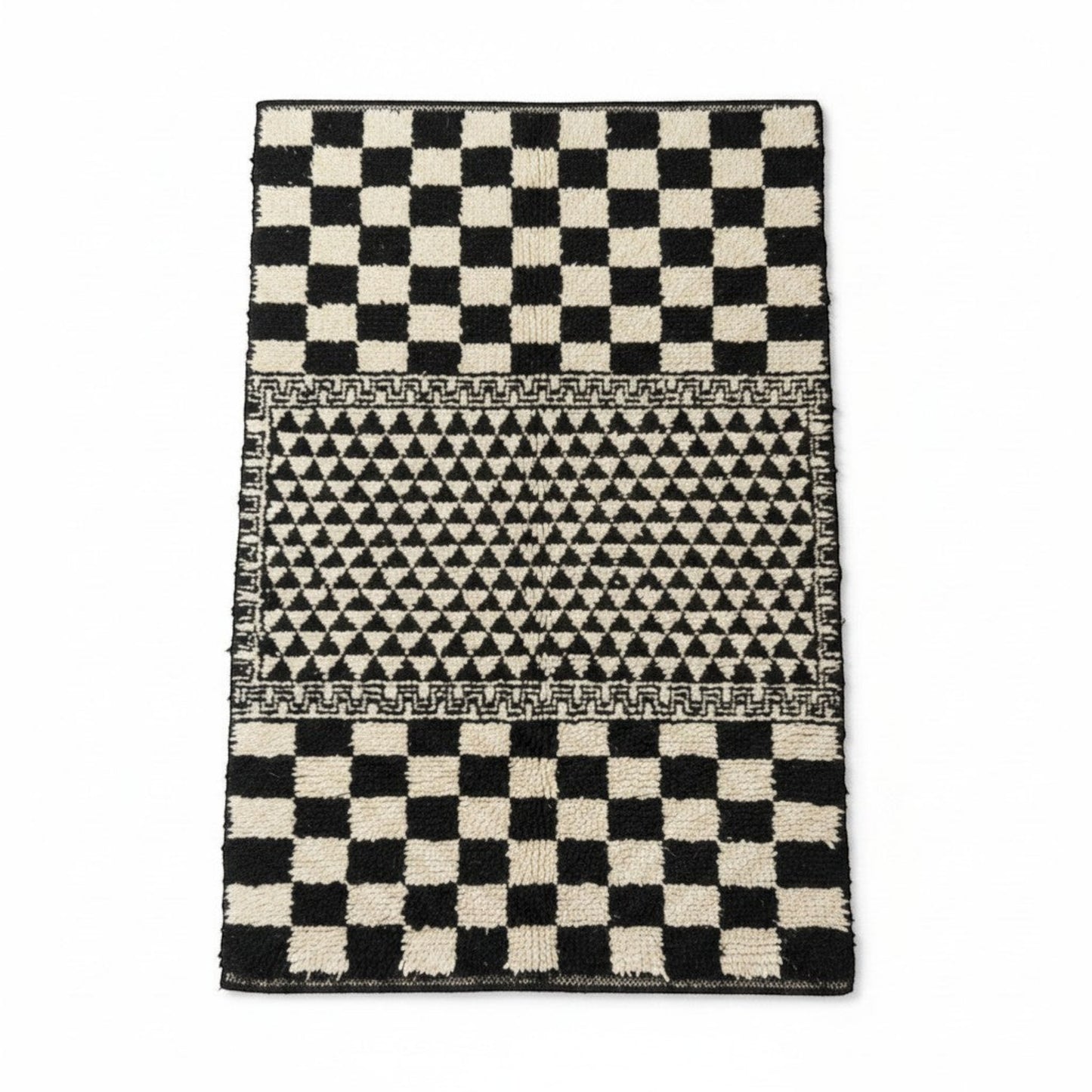 Vliving black and white hand-knotted Moroccan wool blend carpet with geometric patterns and checkerboard ends.
