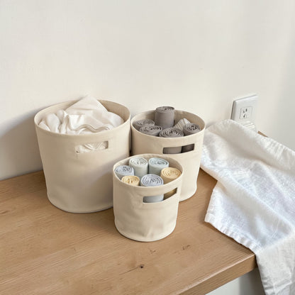 Vliving natural cotton canvas round storage baskets with cut-out handles, set of 3, in neutral tone.