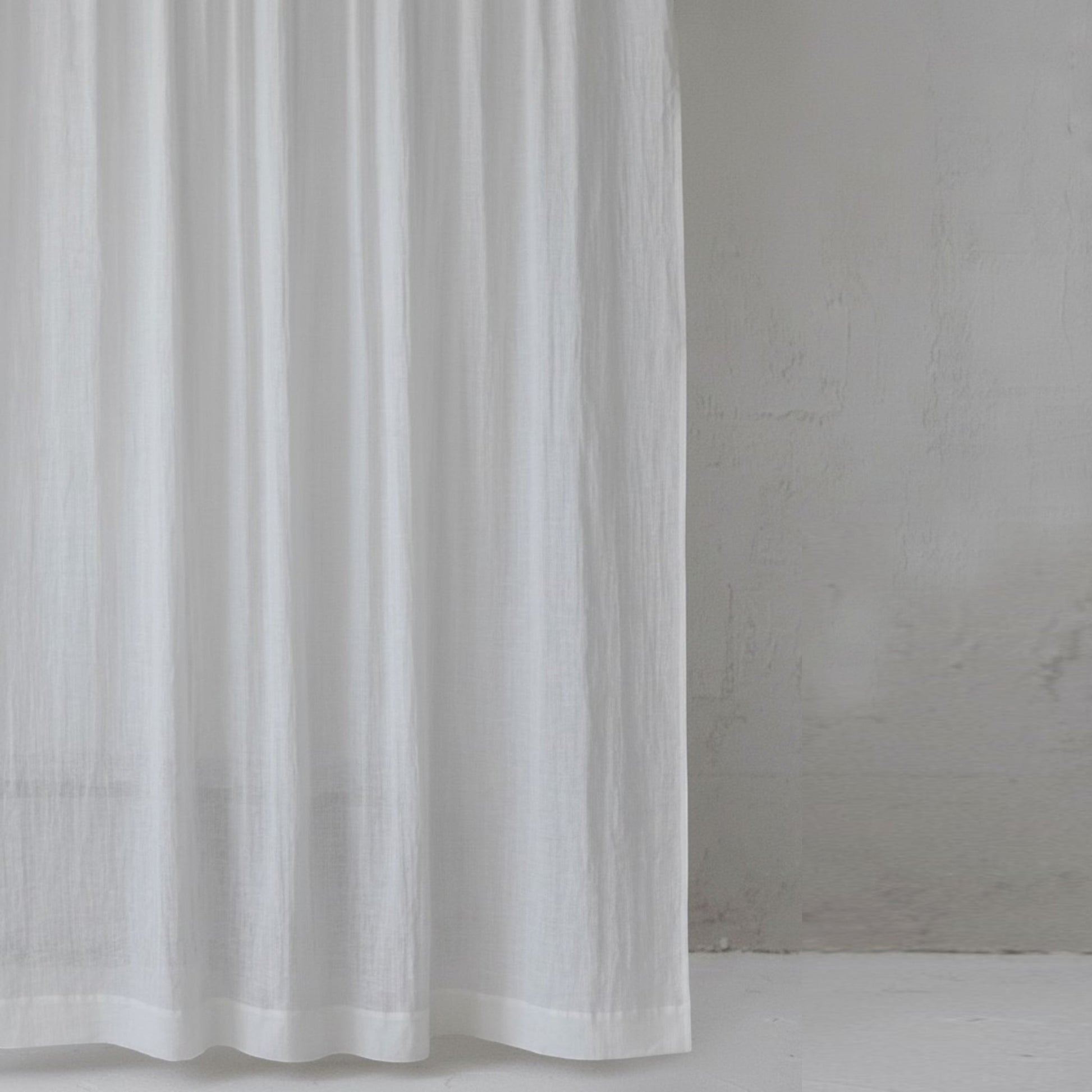 Vliving white pure linen curtain panel with a 2-inch top fold and 4-inch bottom hem, offering a soft, natural texture.